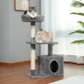 Large multi-layer cat tree tower with scratching posts, hammocks, and cozy condo for indoor cats