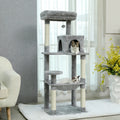 Large multi-layer cat tree tower with scratching posts, hammocks, and cozy condo for indoor cats